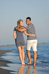 Image showing happy young couple have romantic time on beach