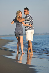 Image showing happy young couple have romantic time on beach