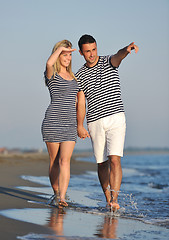 Image showing happy young couple have romantic time on beach