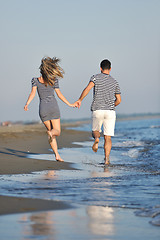 Image showing happy young couple have romantic time on beach