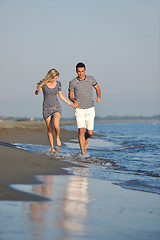 Image showing happy young couple have romantic time on beach