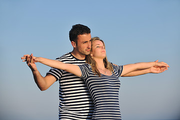 Image showing happy young couple have romantic time on beach