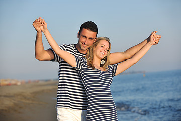 Image showing happy young couple have romantic time on beach