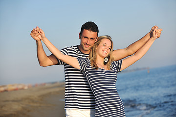 Image showing happy young couple have romantic time on beach