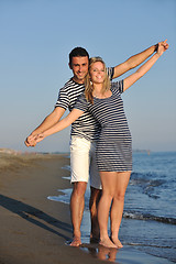 Image showing happy young couple have romantic time on beach