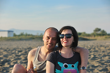 Image showing happy young couple have fun on beach