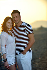 Image showing happy young couple have fun on beach