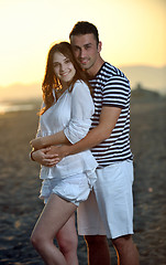 Image showing happy young couple have fun on beach