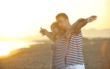 Image showing happy young couple have romantic time on beach