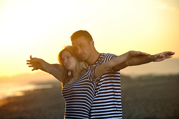 Image showing happy young couple have fun on beach