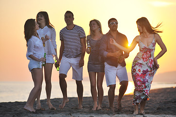 Image showing Group of young people enjoy summer  party at the beach