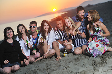 Image showing Group of young people enjoy summer  party at the beach