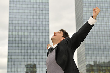 Image showing Photo of happy winner businessman  screaming from joy