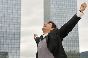 Image showing Photo of happy winner businessman  screaming from joy