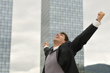 Image showing Photo of happy winner businessman  screaming from joy