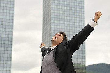 Image showing Photo of happy winner businessman  screaming from joy
