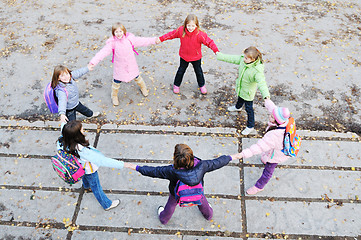 Image showing friendship and teamwork concept with young schoolgirls group