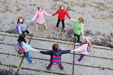 Image showing friendship and teamwork concept with young schoolgirls group