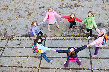 Image showing friendship and teamwork concept with young schoolgirls group