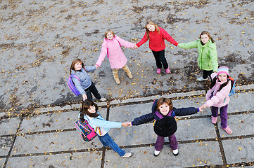 Image showing friendship and teamwork concept with young schoolgirls group