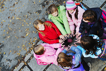 Image showing friendship and teamwork concept with young schoolgirls group