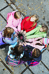 Image showing friendship and teamwork concept with young schoolgirls group
