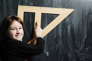 Image showing happy school girl on math classeshappy school girl on math class