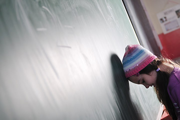 Image showing happy school girl on math classes