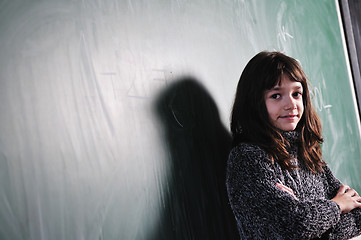 Image showing happy school girl on math classes