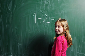 Image showing happy school girl on math classes