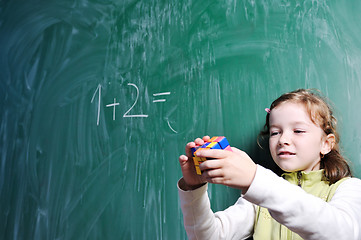 Image showing happy school girl on math classes