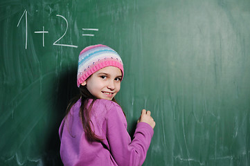 Image showing happy school girl on math classes