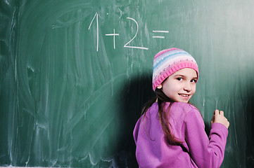 Image showing happy school girl on math classes