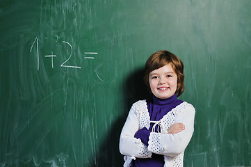Image showing happy school girl on math classes