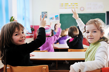 Image showing happy teacher in  school classroom 