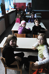 Image showing happy teacher in  school classroom 