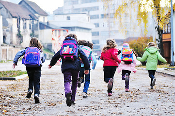 Image showing school girls running away 