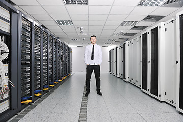 Image showing young engeneer in datacenter server room