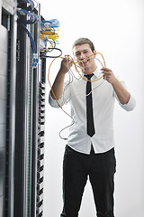 Image showing young engeneer in datacenter server room