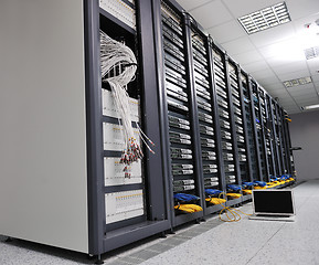 Image showing laptop computer at server network room