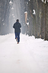 Image showing one older man running at alley 