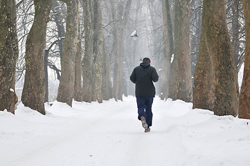 Image showing one older man running at alley 