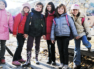 Image showing school girls running away