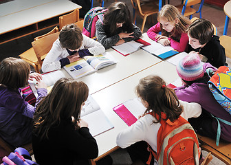 Image showing happy kids with  teacher in  school classroom