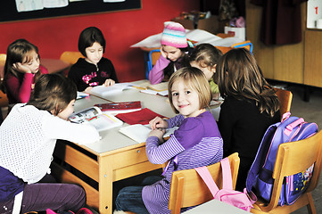 Image showing happy kids with  teacher in  school classroom