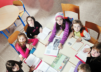 Image showing happy kids with  teacher in  school classroom