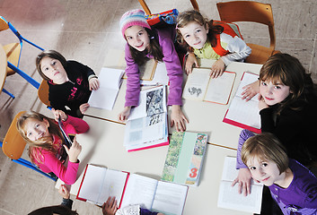 Image showing happy kids with  teacher in  school classroom