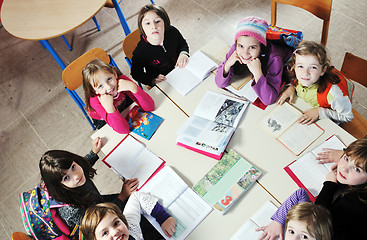 Image showing happy kids with  teacher in  school classroom