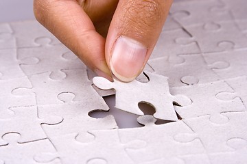 Image showing Playing Jigsaw Puzzle