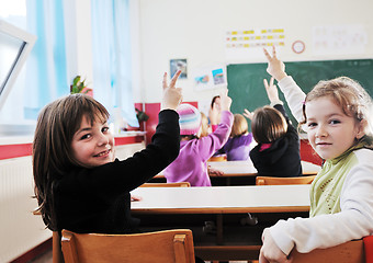 Image showing happy kids with  teacher in  school classroom